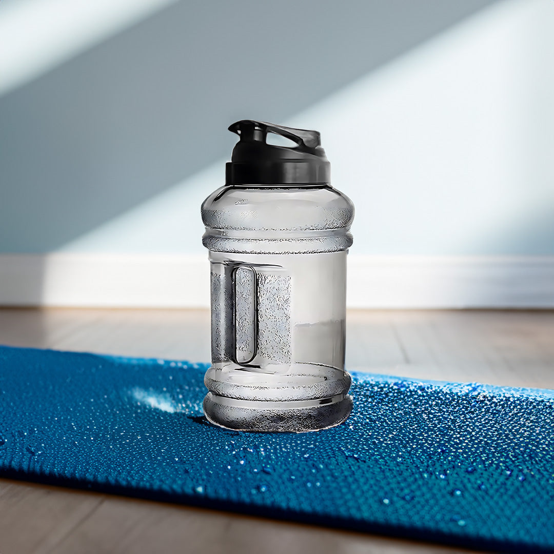 A large 2.5-liter water bottle made of durable, clear plastic with a sturdy handle on the side for easy carrying.